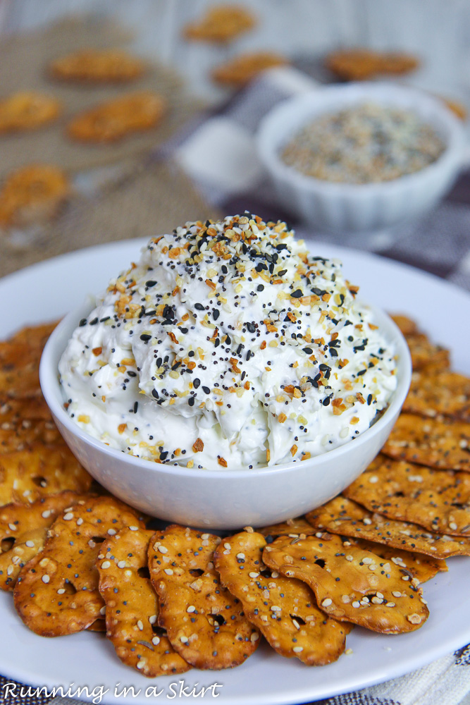 Healthy Everything Bagel Dip in a bowl on a white plate.