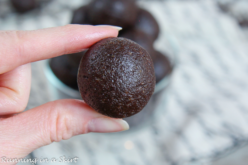 Close up of hand holding a no bake bite.