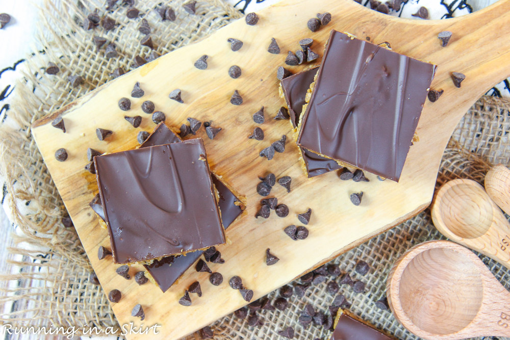 Overhead shot of chocolate bars with chocolate chips and measuring spoons.