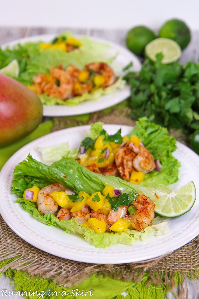 Two plates of Lettuce Wrap Shrimp Tacos recipe.