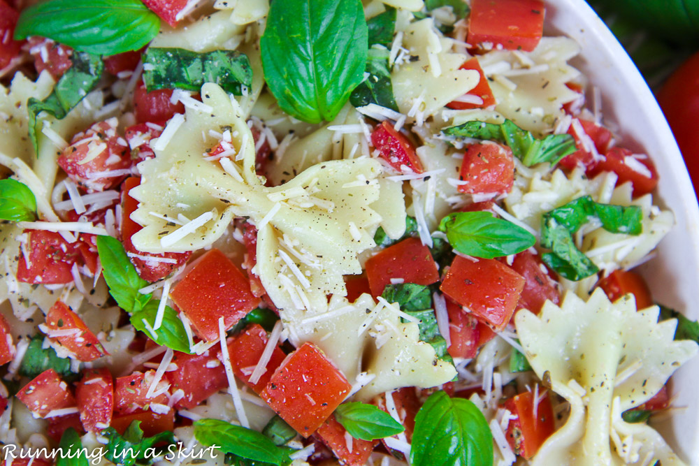 Pasta, tomato, cheese and basil.