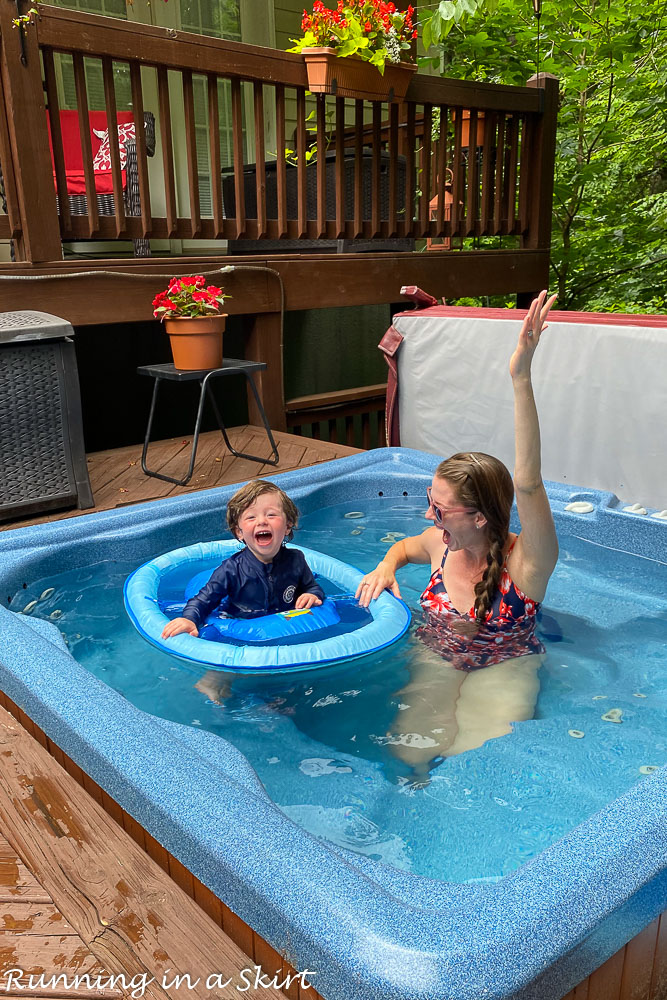 Toddler in a pool learning toddler swim safety.