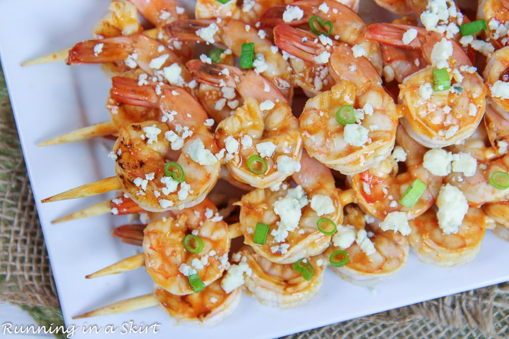 Grilled Buffalo Shrimp topped with blue cheese and green onion.