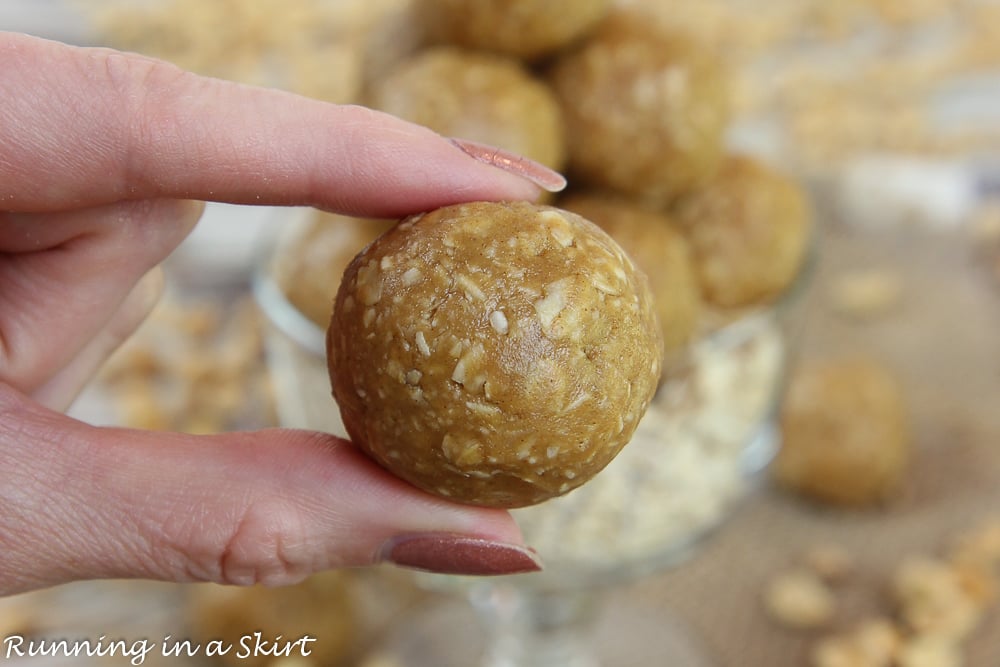 Hand holding 3 Ingredient Peanut Butter Oatmeal Balls.