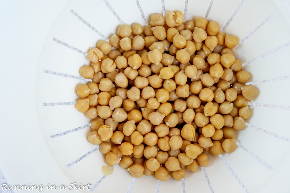 Process photo showing how to rinse the chickpeas.