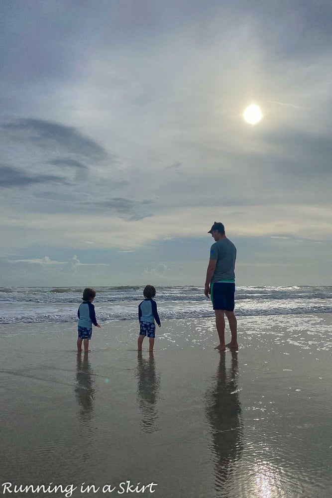 Dad with twins on Amelia Island beach.
