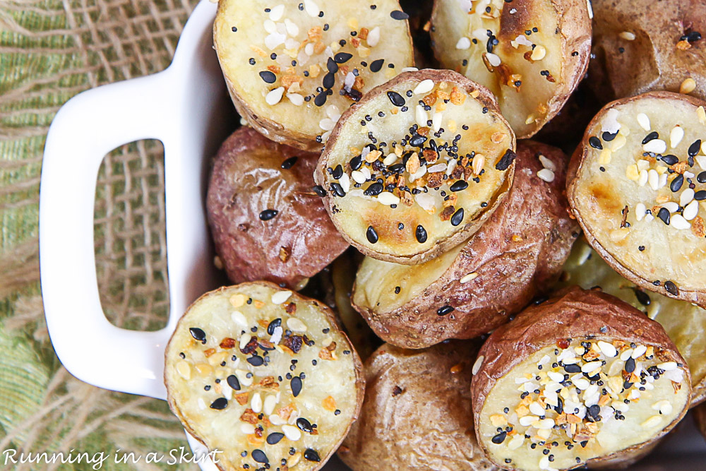 Close up of Everything But the Bagel Potatoes in a white dish.