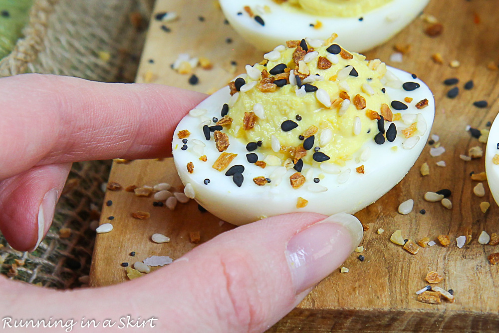 Hand holiday an Everything Bagel Deviled Egg.