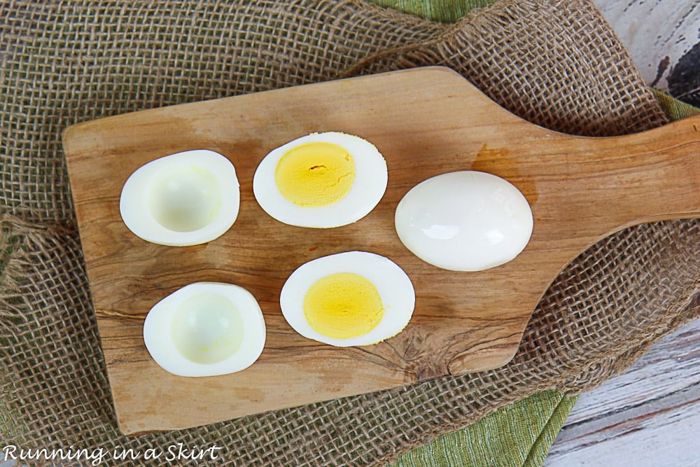 Process shot showing how to remove the yolk from the egg.