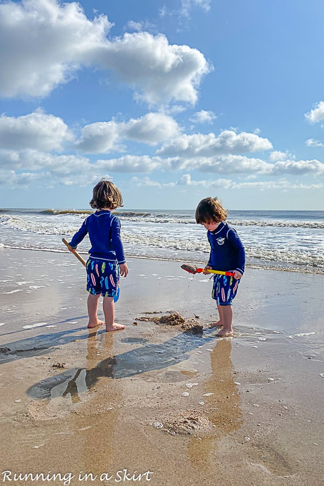 Twins playing on the beach at Amelia Island.