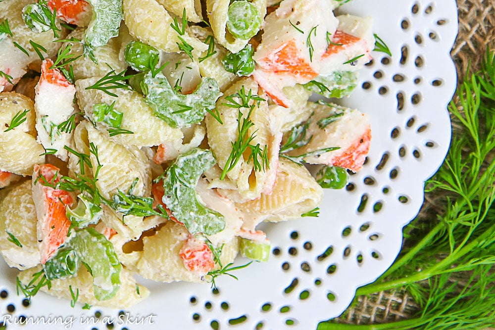 Crab Pasta Salad overhead shot on a white plate.