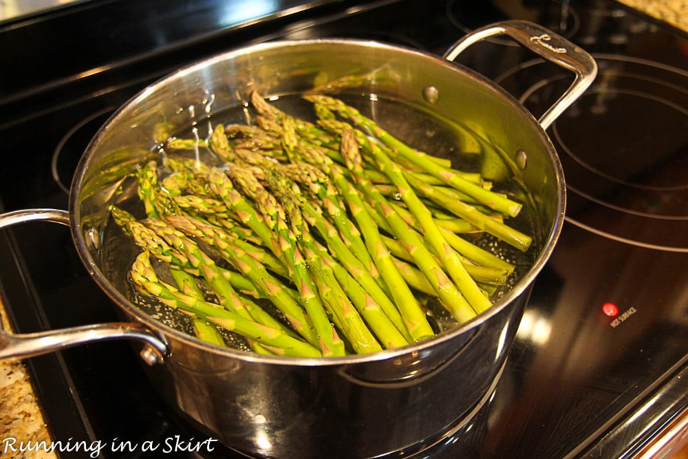 Process photo showing how to prepare the asparagus.