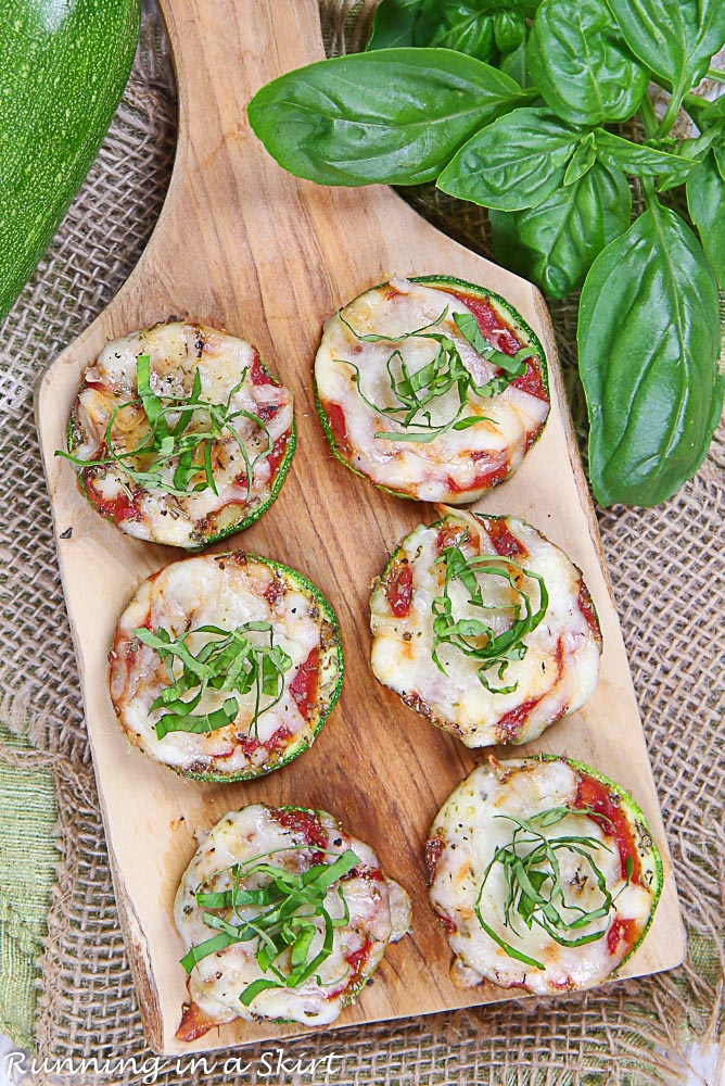Overhead shot of the zucchini pizza bites on the cutting board.