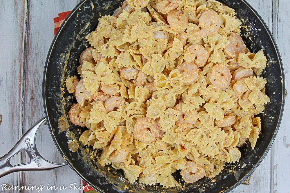 Cajun Shrimp Pasta Recipe in a pan cooking.