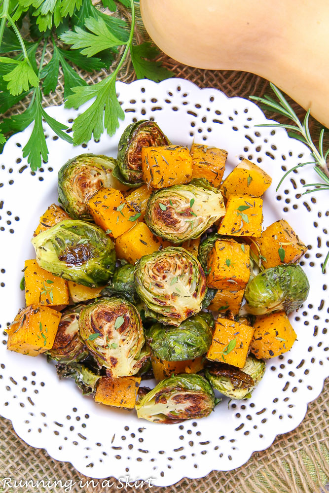 Overhead shot of the Brussels Sprouts and Butternut Squash on a white plate.