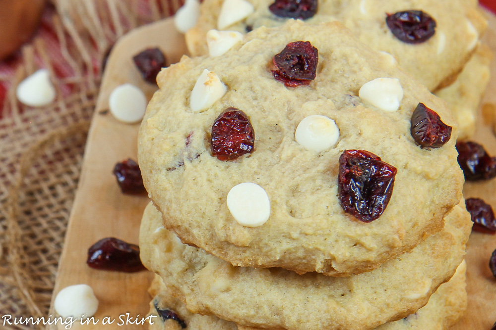 Close up of the White Chocolate Cranberry Cookies on a cutting board.