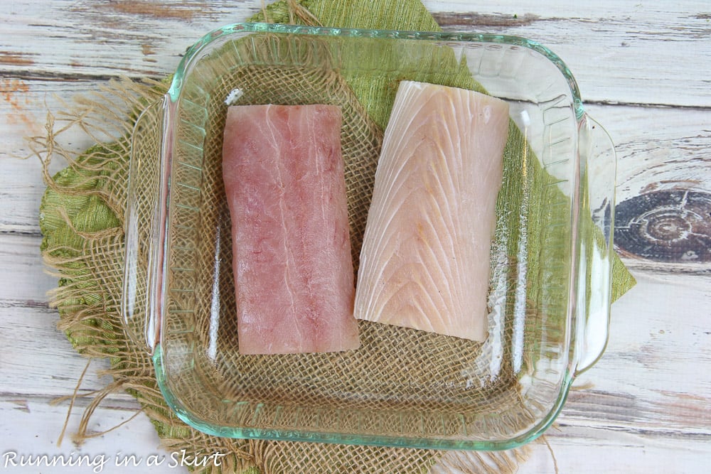 Mahi Mahi fillets in a glass baking dish.