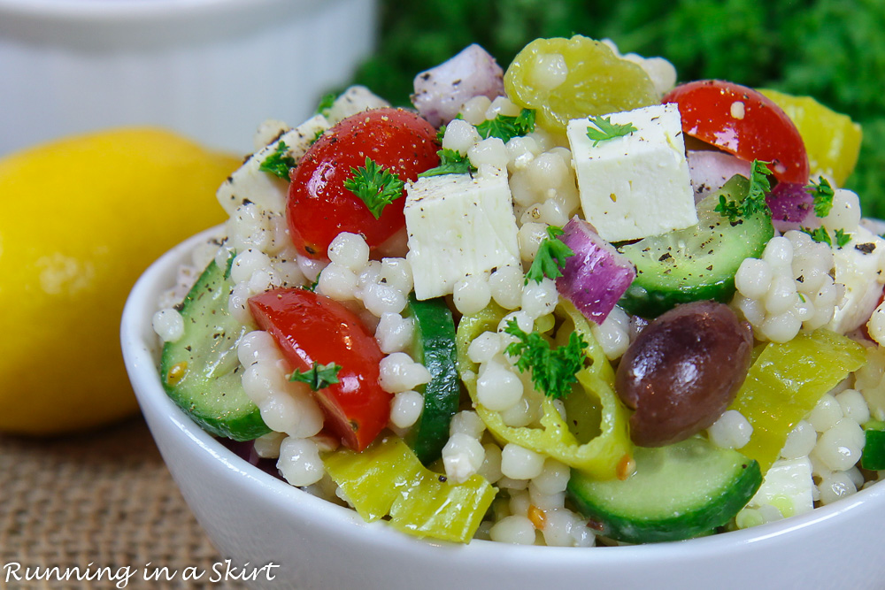 Greek Couscous Salad close up with tomatoes and feta.