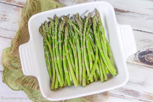 Process photo showing how to assemble the asparagus casserole.