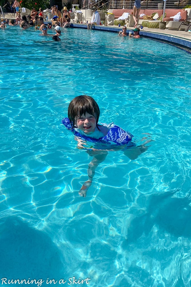 Kid swimming in the pool at Amelia Island.