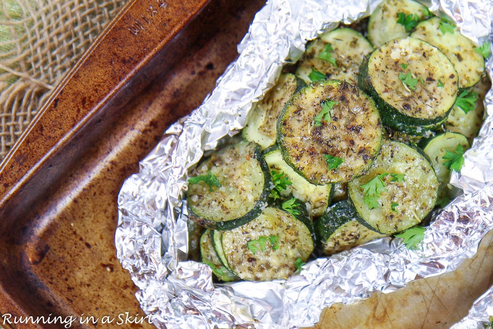 Zucchini on the Grill in Foil on a baking sheet.