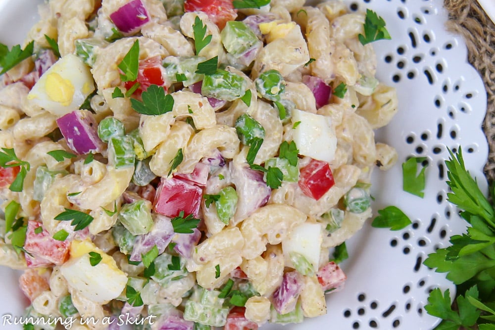 Overhead shot of Healthy Macaroni Salad on a white plate.