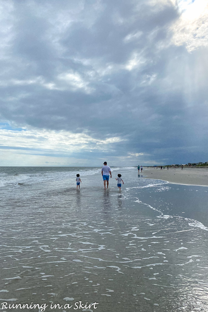 Things to Do in Isle of Palms - Dad and sons on the beach.