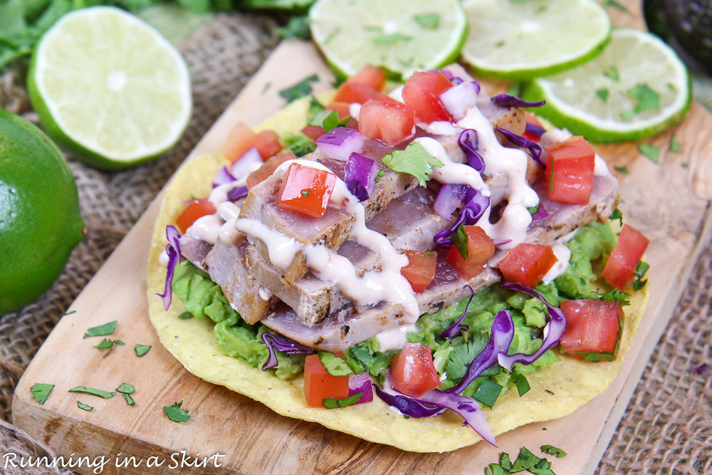 Ahi Tuna Tostada on a wooden cutting board.