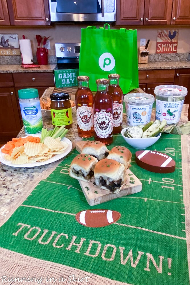 Vegetarian Sliders with game day food spread.