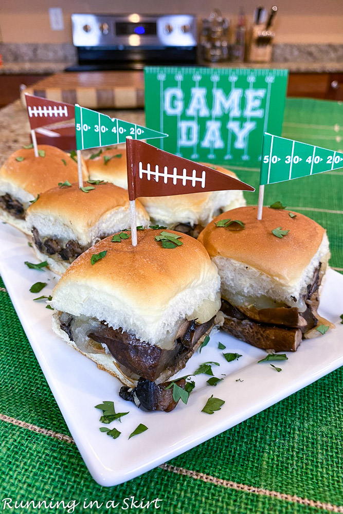 Close up of Vegetarian Sliders on a white plate with football flags.