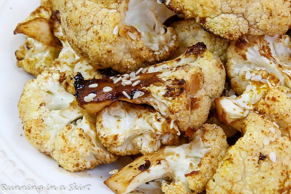 Roasted Asian Cauliflower with sesame seeds on top.