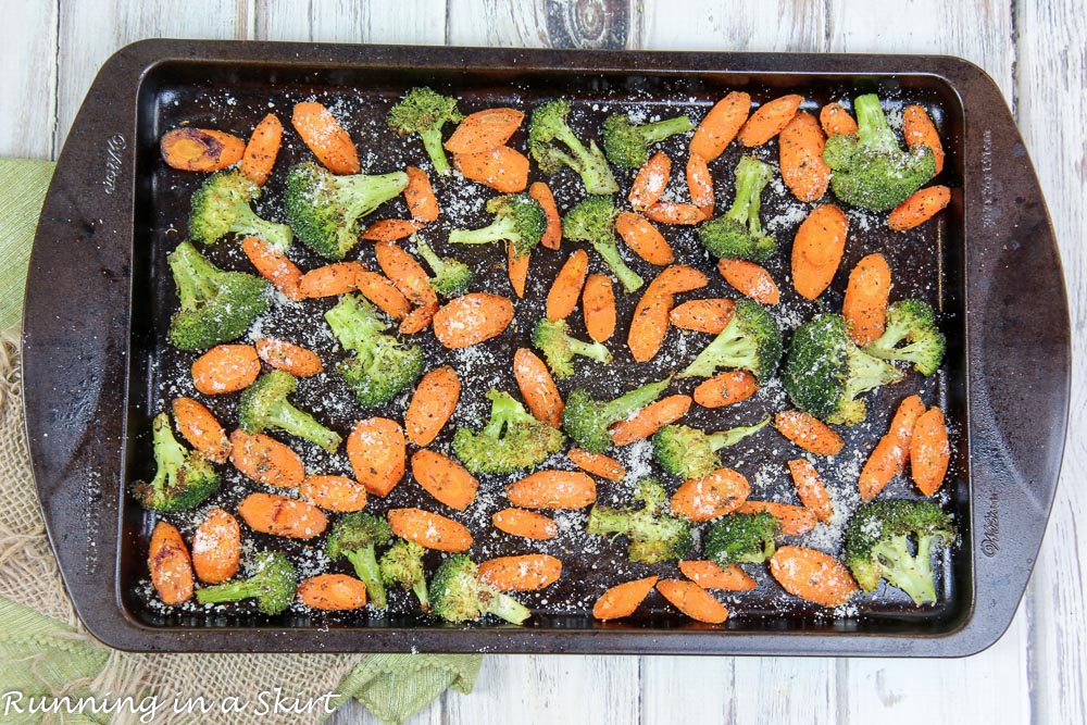 Roasted Broccoli and Carrots on the sheet pan after roasting.