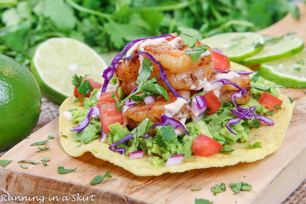 Shrimp Tostadas on a cutting board.