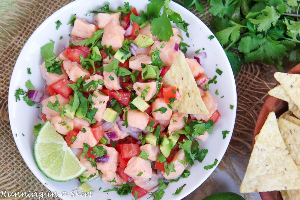 Salmon Ceviche on a flat white plate.