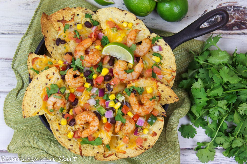 Shrimp Nachos recipe overhead shot in a cast iron skillet.