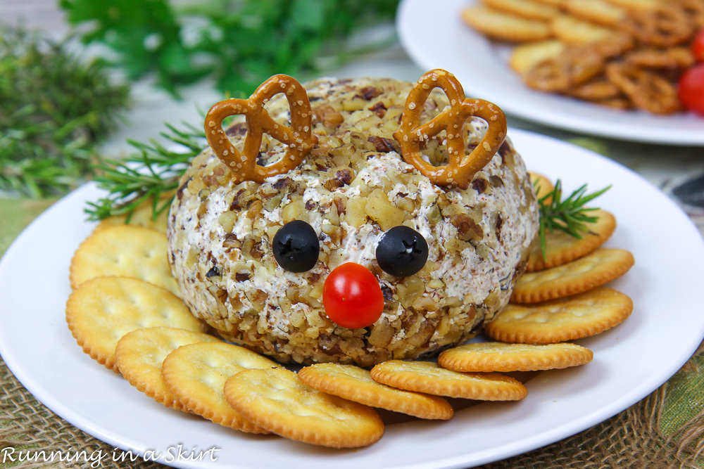 Christmas Cheese Ball on a white plate.