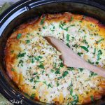 Crock Pot Baked Ziti with a spoon.