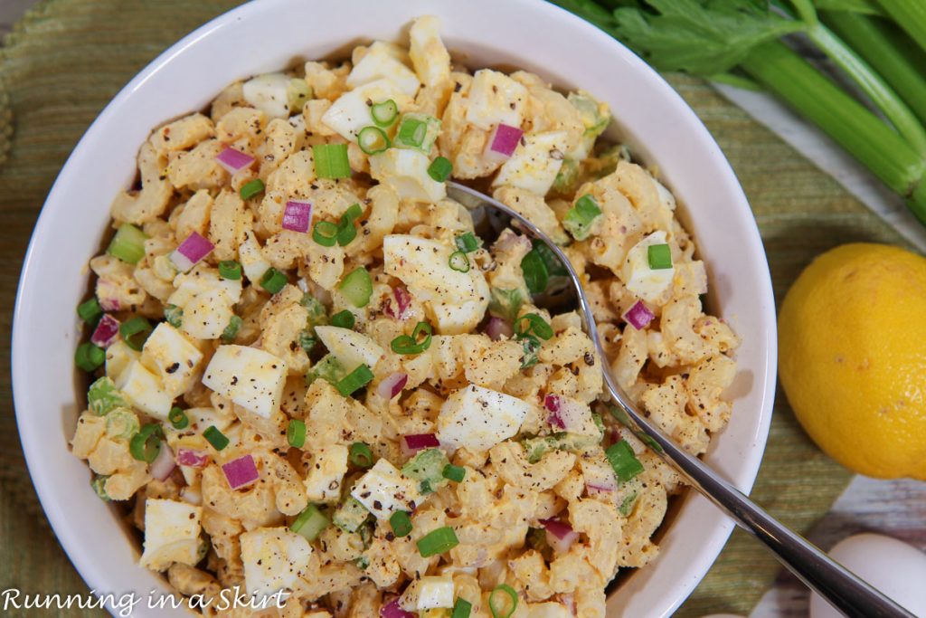 Deviled Egg Pasta Salad overhead shot of bowl with spoon.