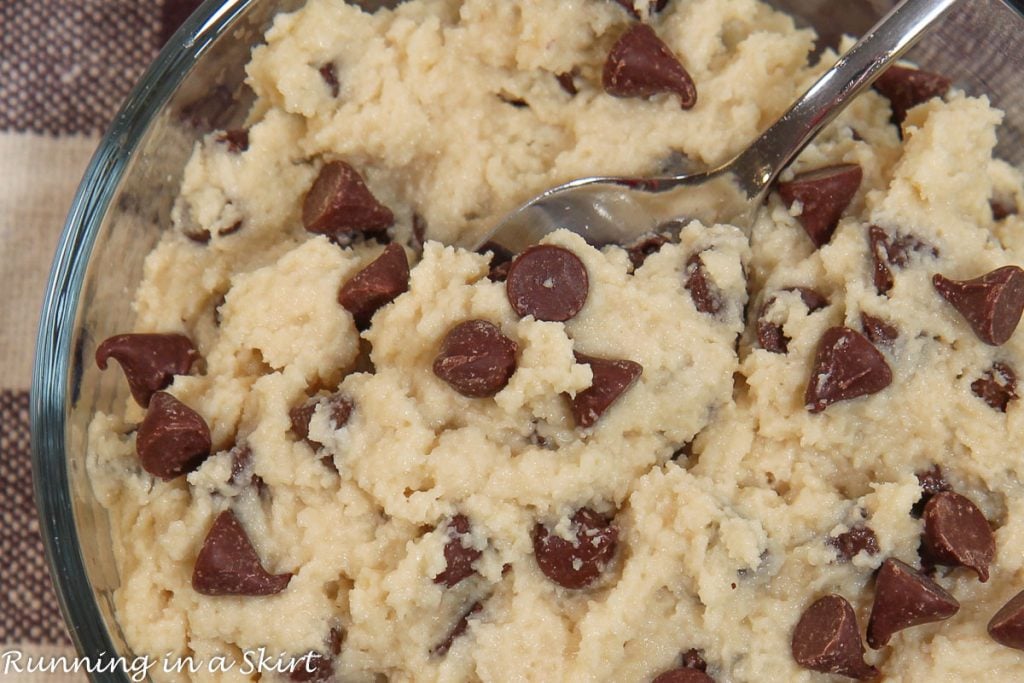 Close up of cottage cheese cookie dough in a bowl with a spoon.