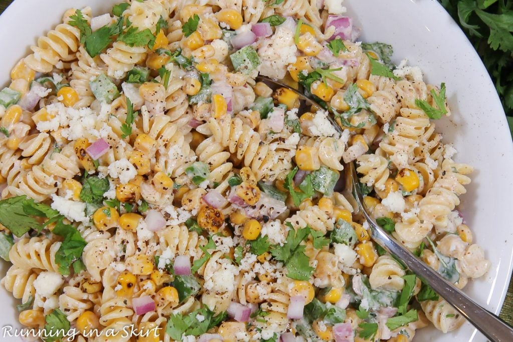 Mexican Street Corn Pasta Salad close up with spoon.