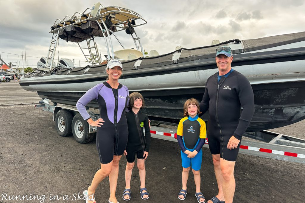 Family in wetsuits getting ready for Manta Ray Swimming.