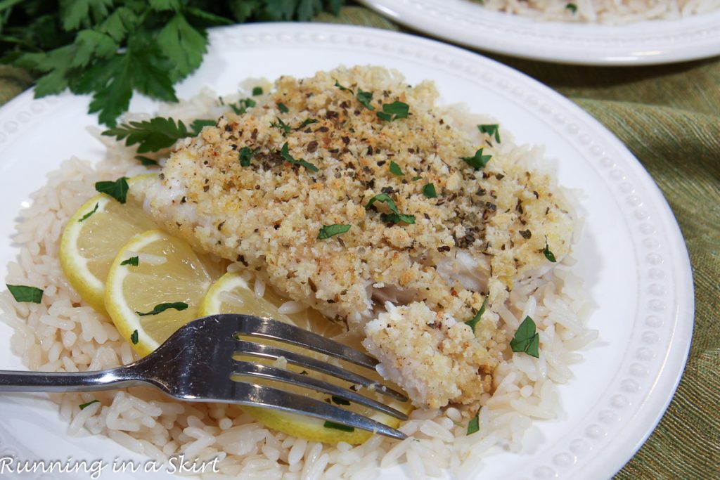 Parmesan Crusted Cod flaked with a fork.